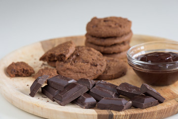 Brown biscuits with dark chocolate composition