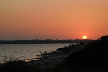 Sunset at playa migjorn, Formentera, in the distance Cap de Barbaria