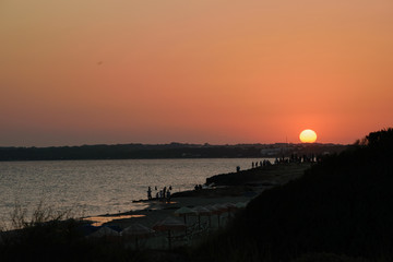 Fototapeta na wymiar Sunset at playa migjorn, Formentera, in the distance Cap de Barbaria