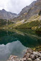 Fototapeta na wymiar Tatra National Park, Poland. Small Mountains Lake 'Morskie Oko' In Morning. Five Lakes Valley. Beautiful Scenic View.