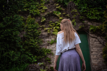 woman with flowers in garden