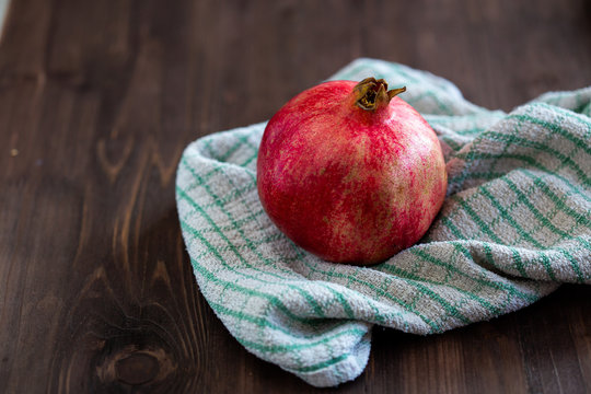 Pomegranate on a tea towel