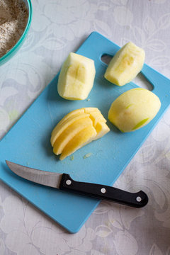 Apples cut on a kitchen board