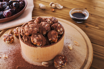 Homemade energy balls with chocolate, cream and cocoa