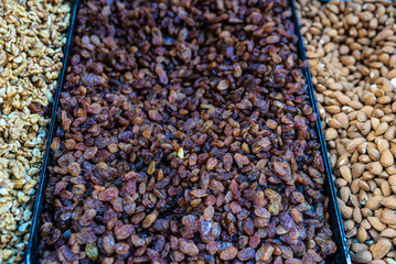 Raisin or dried grape as background