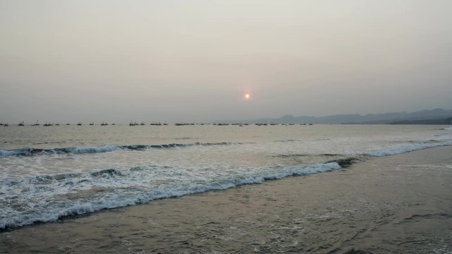 Aerial 4K drone flying over Tropical Beach of Pelabuhan Ratu in Suka Bumi, West Java, Indonesia. Drone Videos on tropical beach