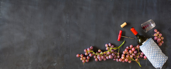 wine bottle,grapes,corkscrew and wine cork,flat lay, panoramic, free copy space