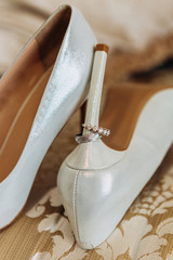 wedding rings composition details bridesmaid shoes heels