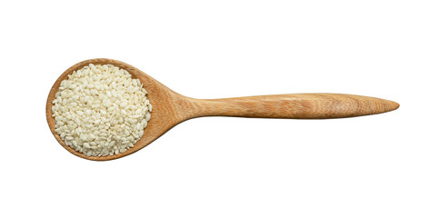 White sesame seeds in wooden spoons isolated on white background.Scientific name is Sesamum orientale L. cereal, Herb, top view and close up.