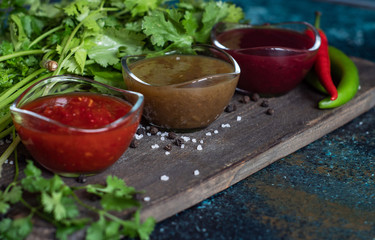 Georgian sauces on stone background