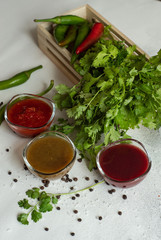 Georgian sauces on stone background