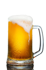 cold mug of beer with foam isolated on white background