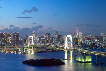 Fototapeta na wymiar Twillight view of Tokyo Bay , Rainbow bridge and Tokyo Tower landmark