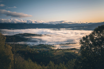 Misty sunset on pyrenees mountains