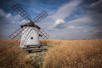 Fototapeta na wymiar Old wooden windmill