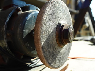 close-up electric motor with grinding wheel