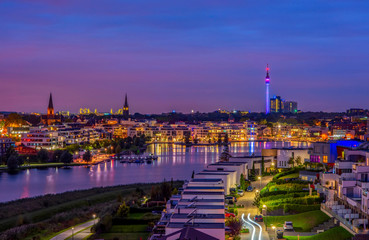 Amazing panoramic view of Phoenix Lake in Dortmund, Germany over city skyline and Florian Tower...