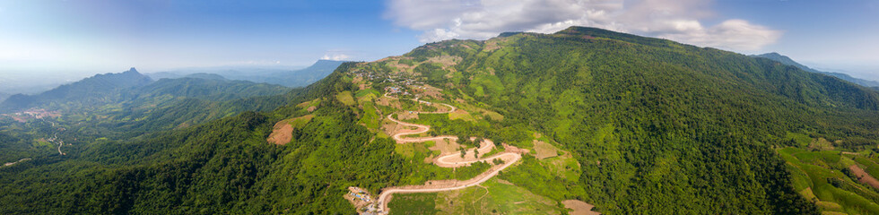 Fototapeta na wymiar Top view Aerial photo from flying drone over Mountains and winding mountain paths exciting steep at Phu Thap Boek ,Phetchabun Province,Thailand,ASIA.