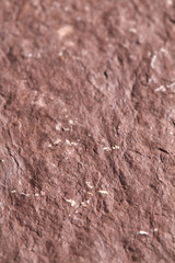 Grainy red stone texture. Natural backgrounds and textures. Decor and design.