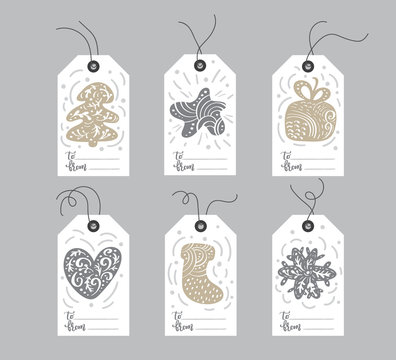 Set of hand drawn doodle scandinavian Christmas element tags with place for text. Collection holiday vector gift tags and bundle decorative hygge xmas elements