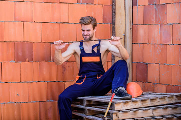 male power. professional repairman hard hat bend fittings. building and construction. engineer with...