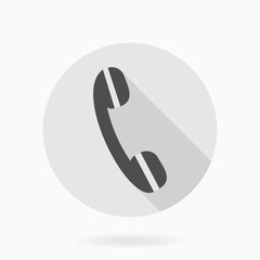 Black vector telephone receiver in the circle. Flat design with long shadow