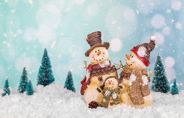 Wintery Scene With Snowmen Family