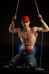 guy dancer athletic body posing with naked torso c chains