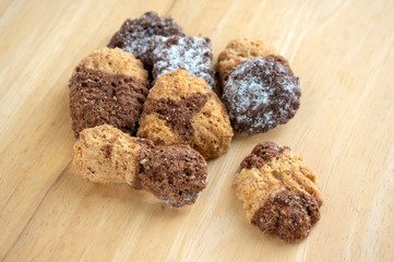 Cinnamon sandbakelse christmas cookies, two color, cocoa dark brown and vanilla light golden brown, delicious cookies