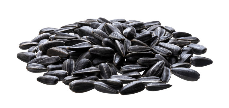 Black sunflower seeds isolated on white background with clipping path