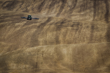 tractor on wavy field