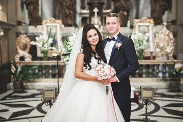 Wedding couple bide and groom get married in a church