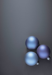 Christmas baubles on modern background for design winter holiday card.