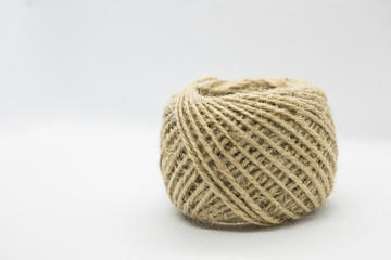 A roll of light brown color string