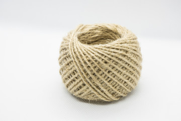 A roll of light brown color string
