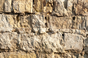 Old broken brickwork background.