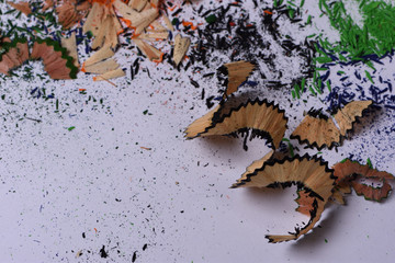 abstract background from shavings of colored pencils stylus