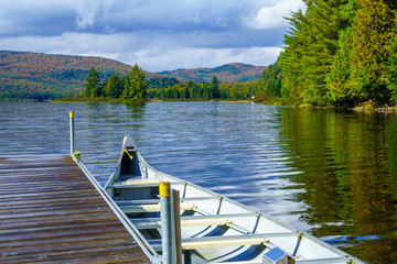 Pier and boat in Monroe Lake, in Mont Tremblant National Park