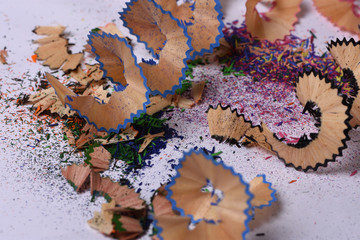 abstract background from shavings of colored pencils stylus