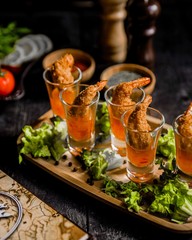 shrimps in barbecue sauce on the table
