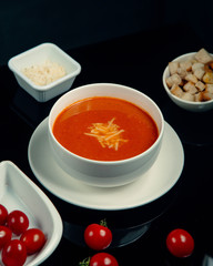tomato soup with cheese and crutones