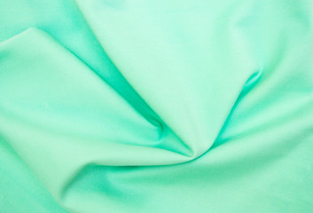 fabric lay in soft folds, gentle mint color