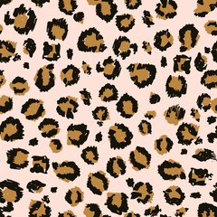 Seamless leopard fur pattern brush design vector illustration. Cover of fashion ornament print in yellow color. Wrap or textile with jaguar trendy spots on pink background