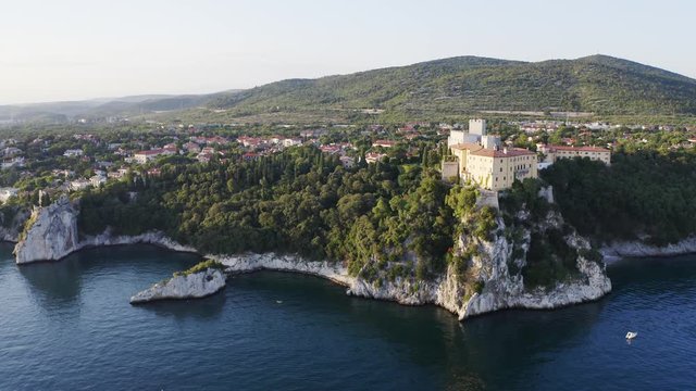 Castle on rock above sea