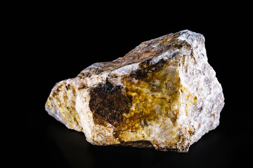 Basalt rock isolated in black, used in construction and landscaping.