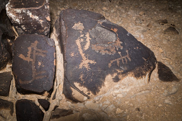 Night view of a drawing carved in stone by a primitive man in the desert in southern Israel near the Avdat fortress