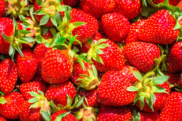 fresh ripe strawberry close up background texture