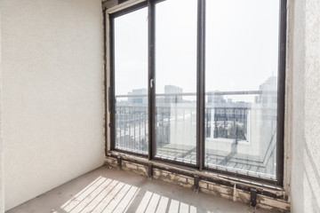 interior of the apartment without decoration in gray colors