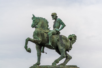 Fototapeta premium The monument to Hans Waldmann on the embankment of the Limmat river in the city of Zurich. Hans Waldmann was mayor of Zurich and a Swiss military leader.