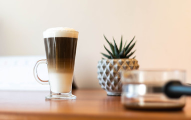 coffe weith milk on wooden table